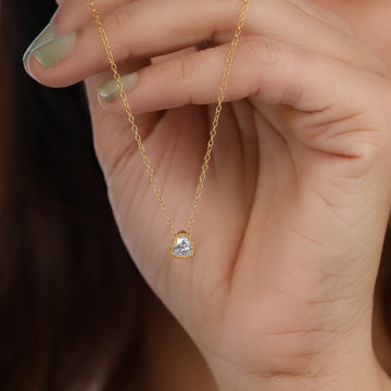Heart Bezel Set Diamond Solitaire Pendant on model hand