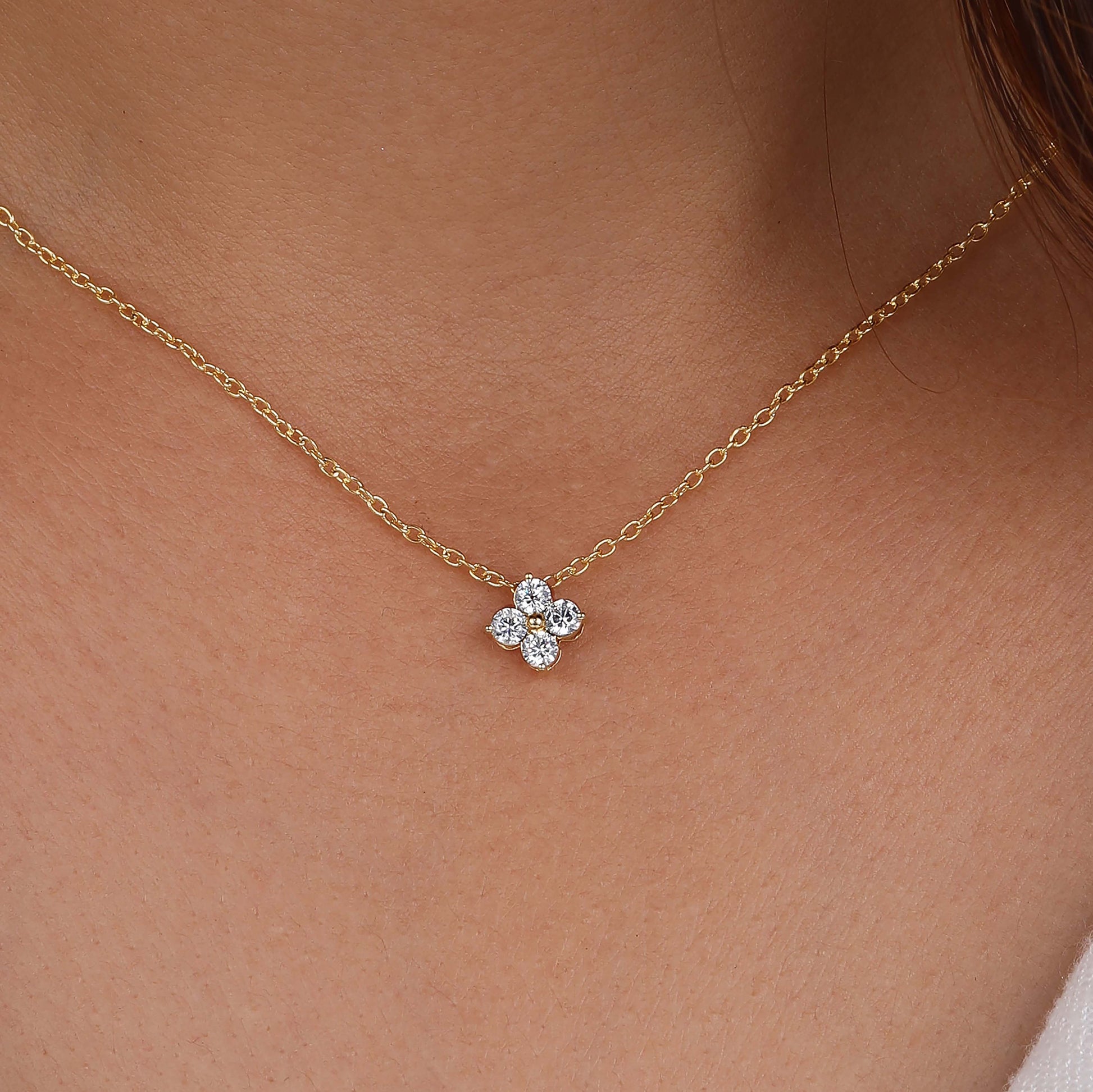 she is wearing moissanite diamond necklace