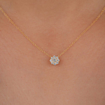 a necklace with a diamond flower