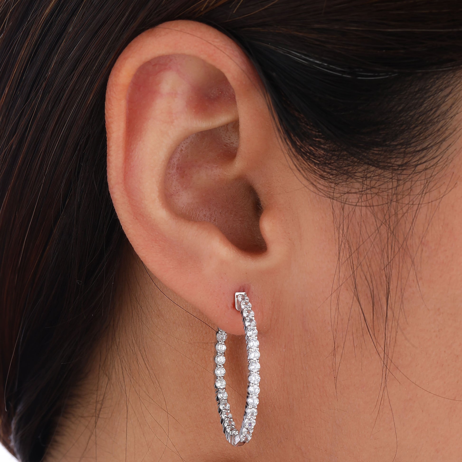 lab grown diamond hoop earring in model ear