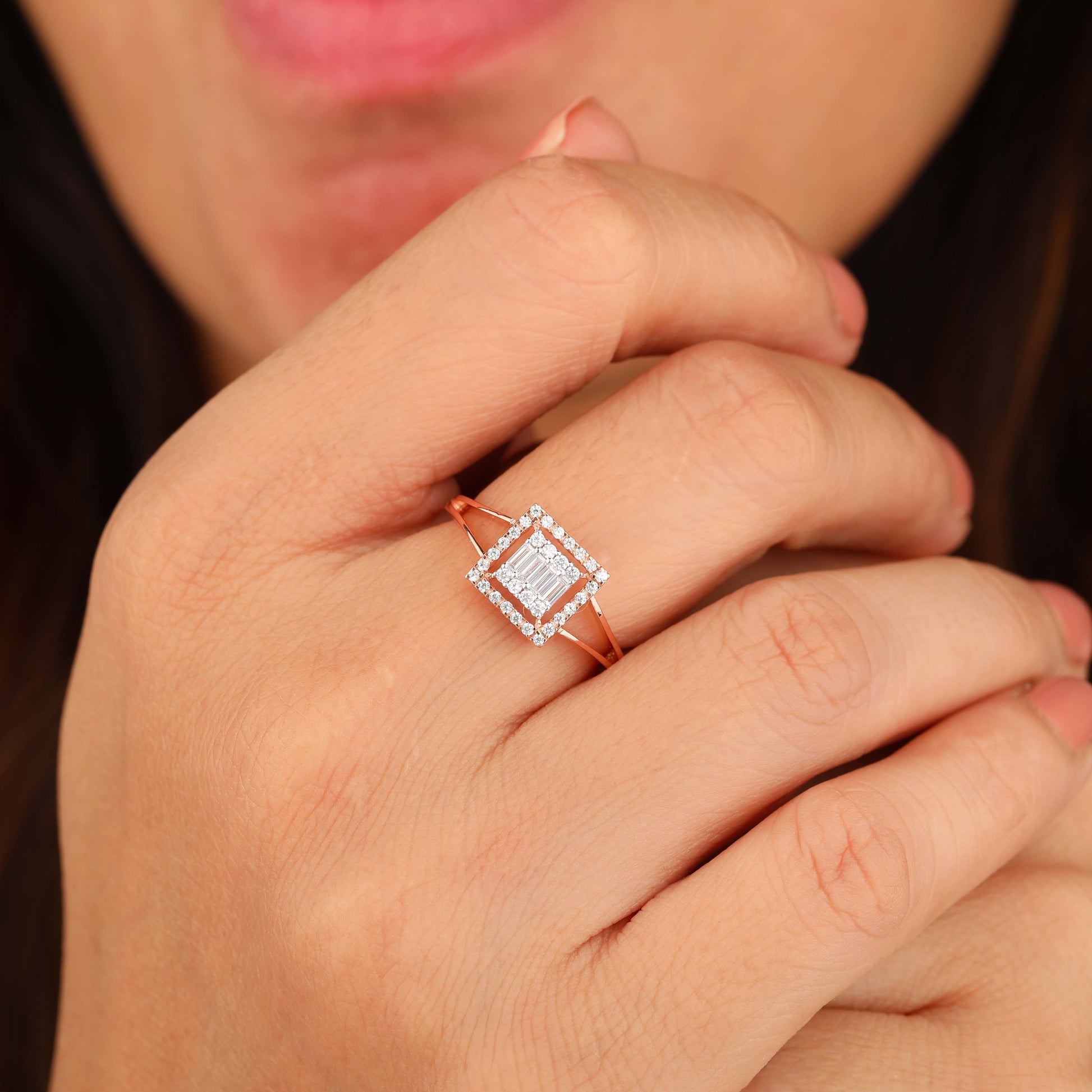 A person wearing Halo engagement Ring