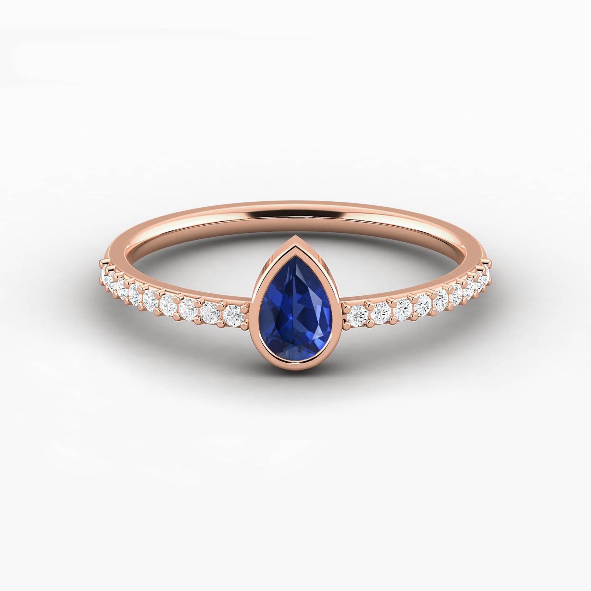 bllue sapphire pear shape bezel set engagement ring