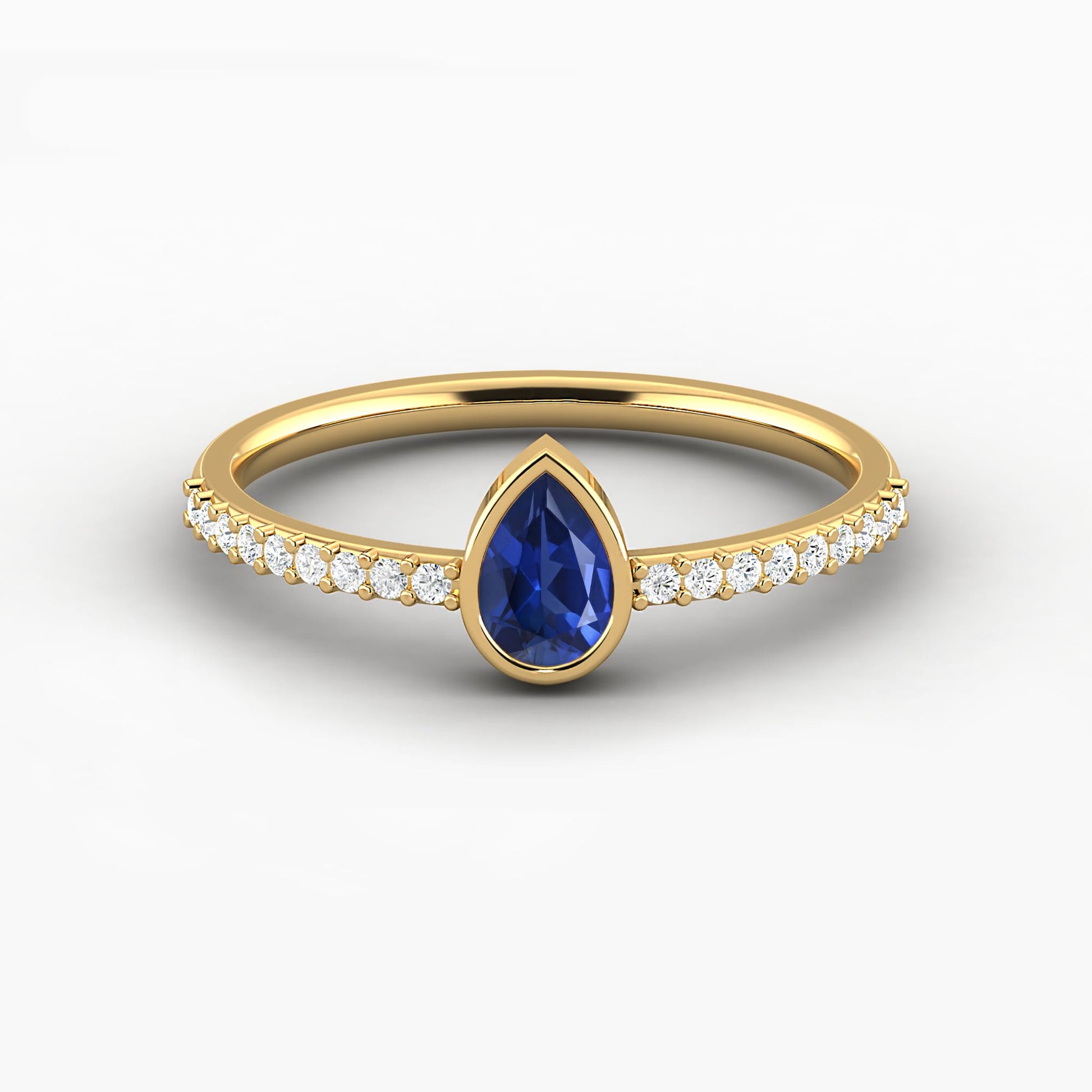 blue sapphire pear shape bezel set engagement ring