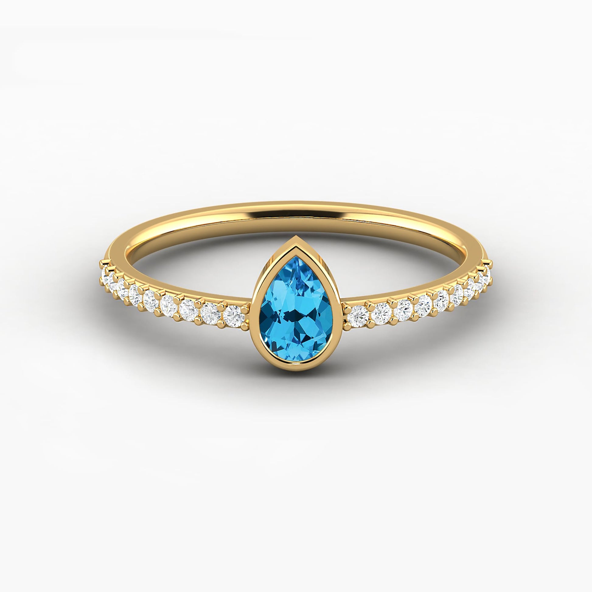 blue topaz pear shape bezel set engagement ring