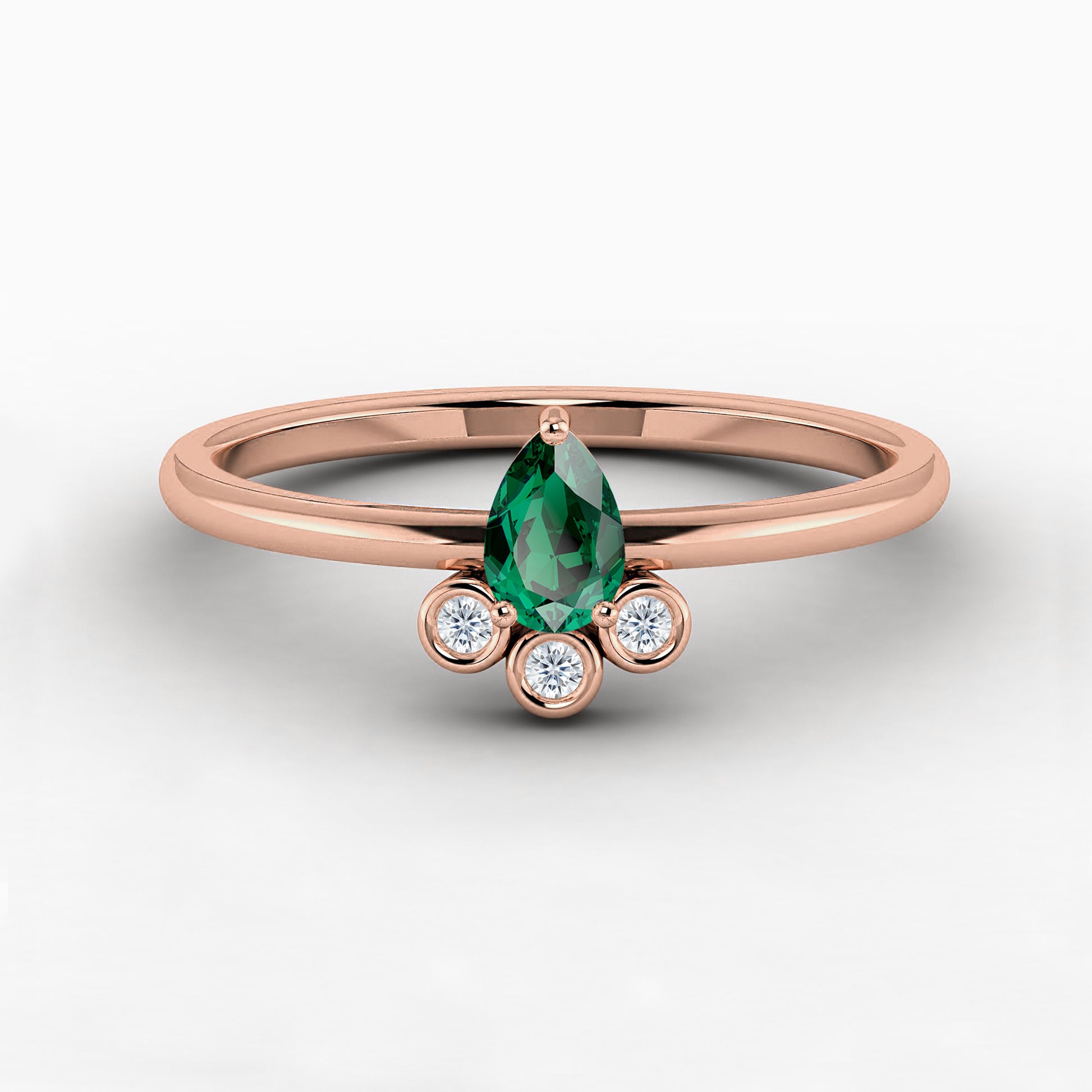 emerald gemstone pear shape engagement ring
