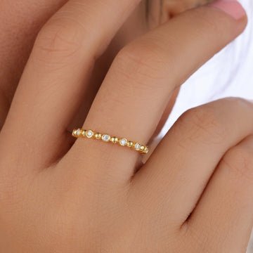Diamond and gold beaded ring