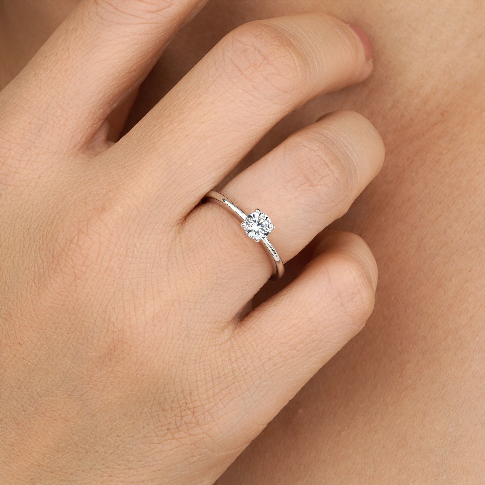 Round moissanite engagement ring