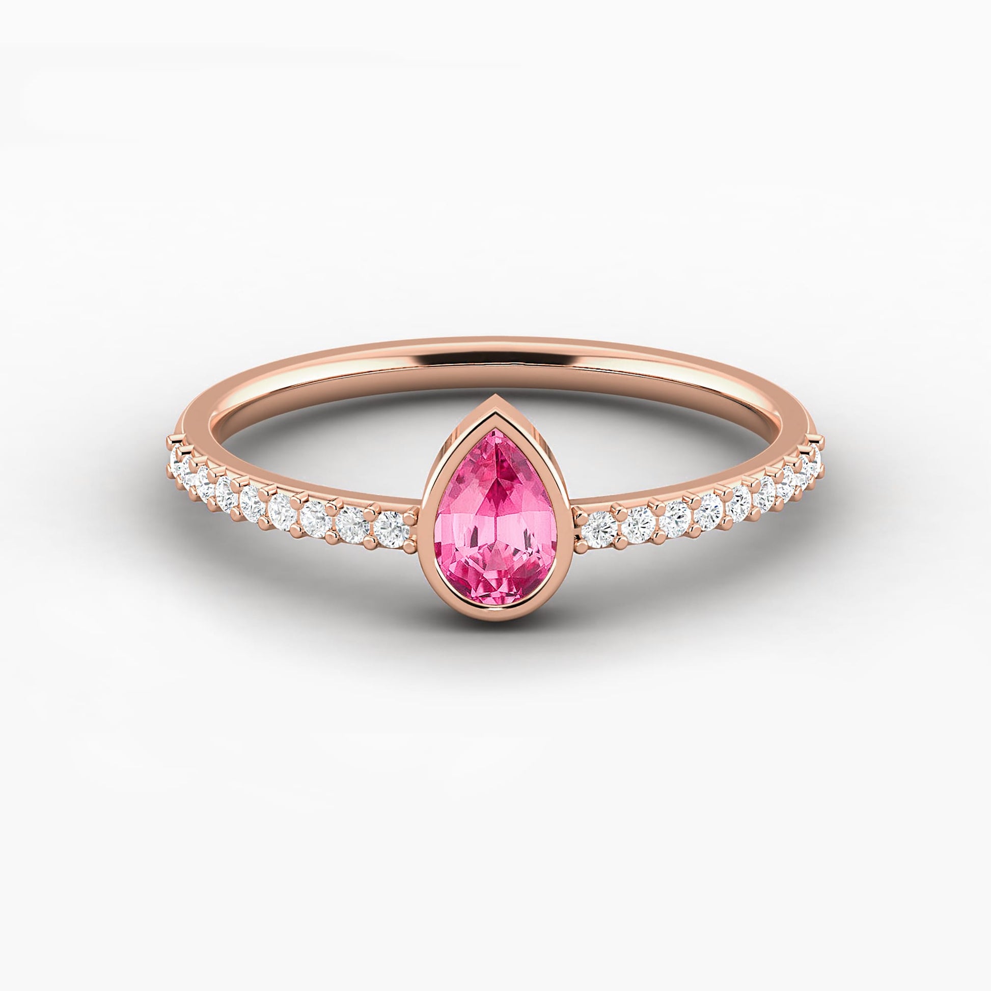 rose gold pear shape bezel set engagement ring