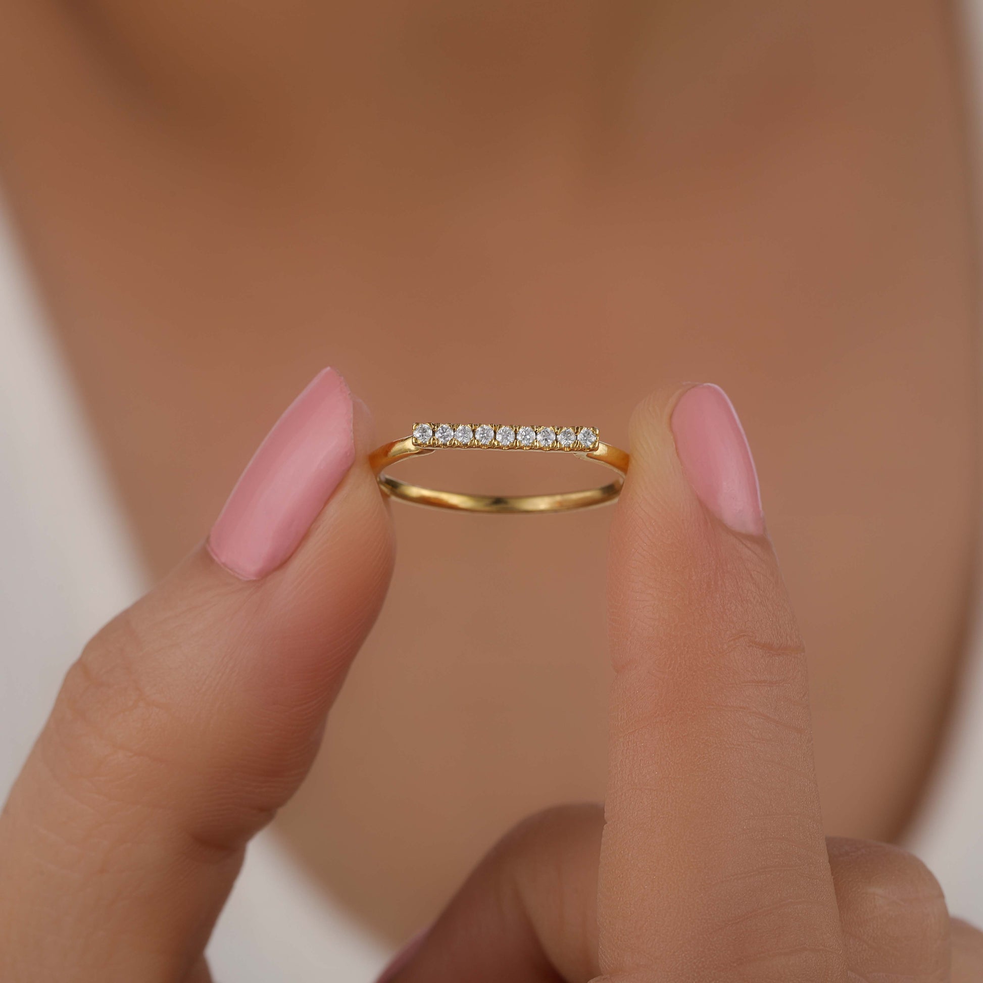 Stackable wedding ring on Model hand