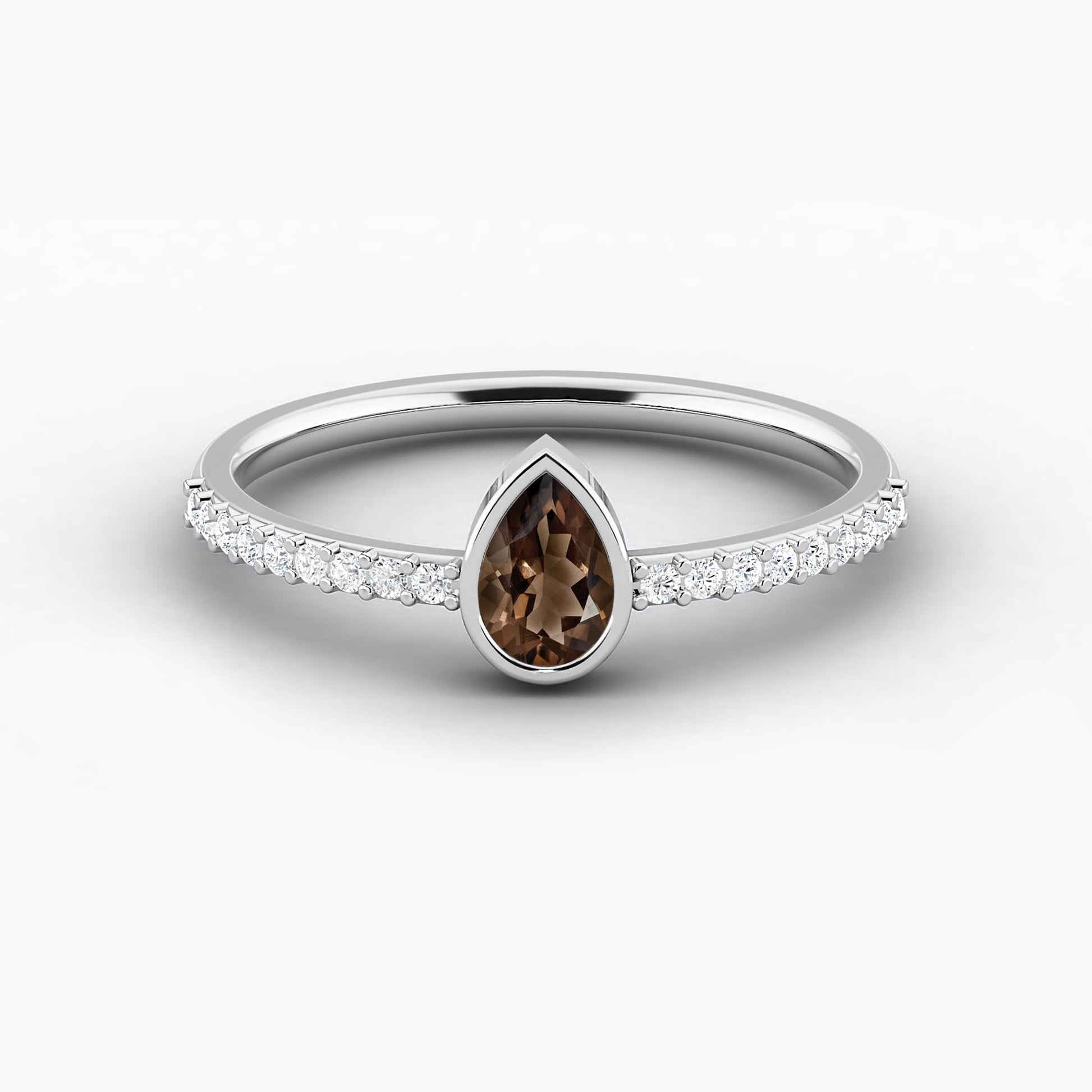 white gold pear shape bezel set engagement ring