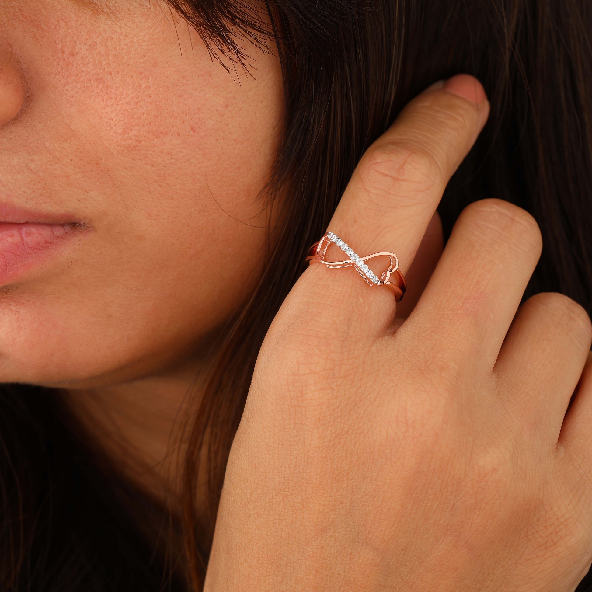 diamond Infinity ring on model hand