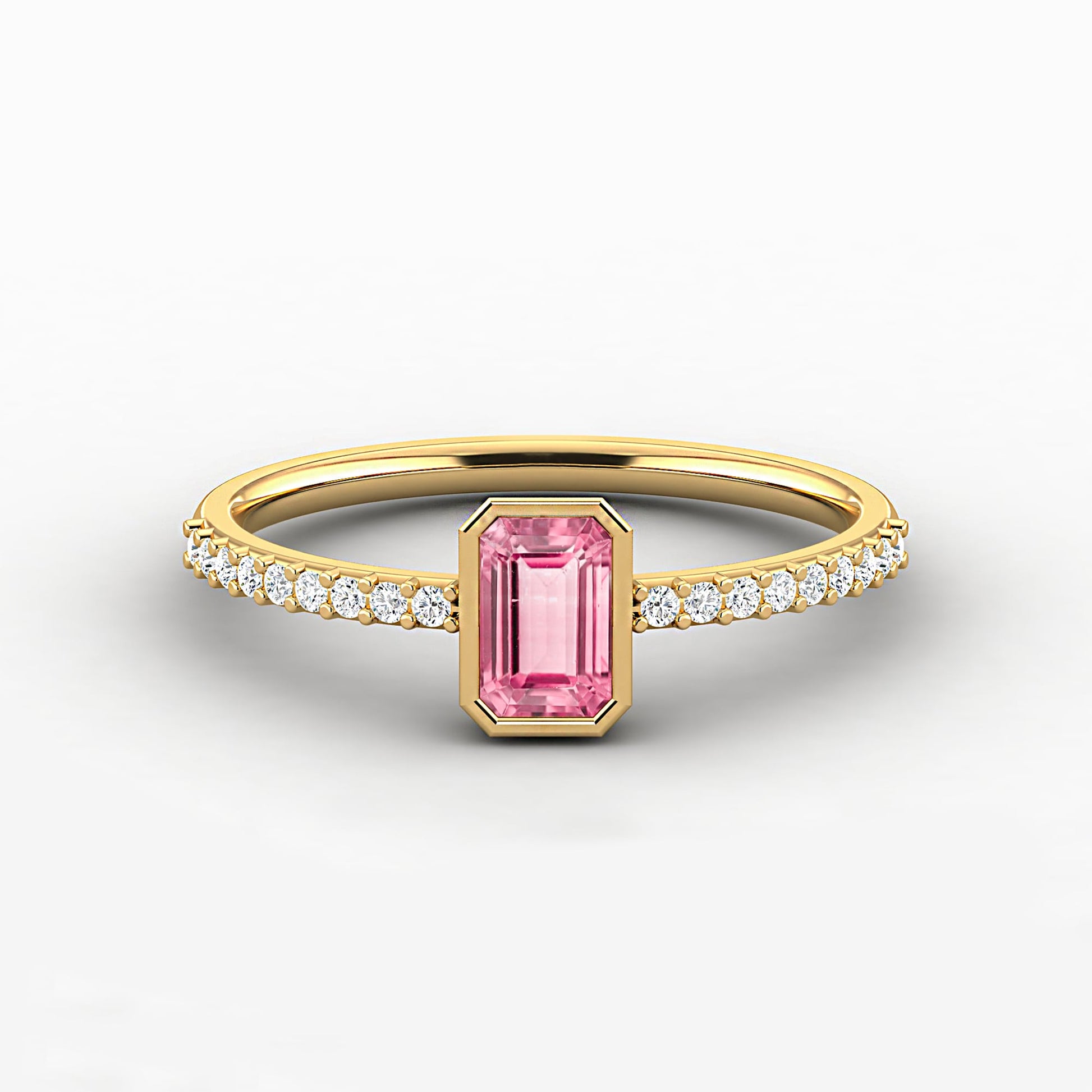 a ring with a pink gem