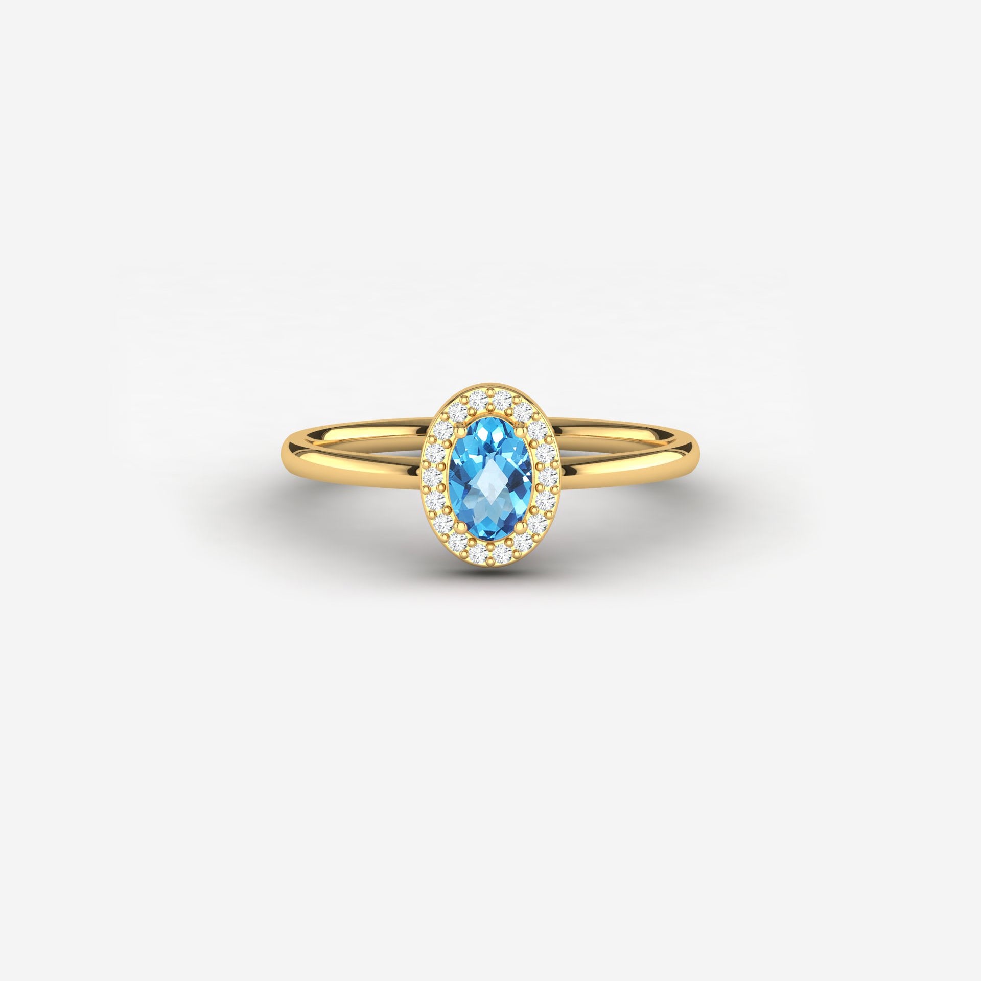 blue topaz yellow gold gemstone ring